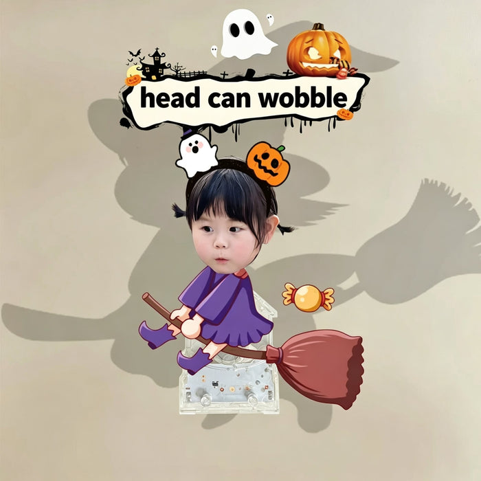 Custom broom rider witch photo wobble figure — little girl in a purple dress riding a broom with a pumpkin headband and candy, personalized Halloween desk ornament