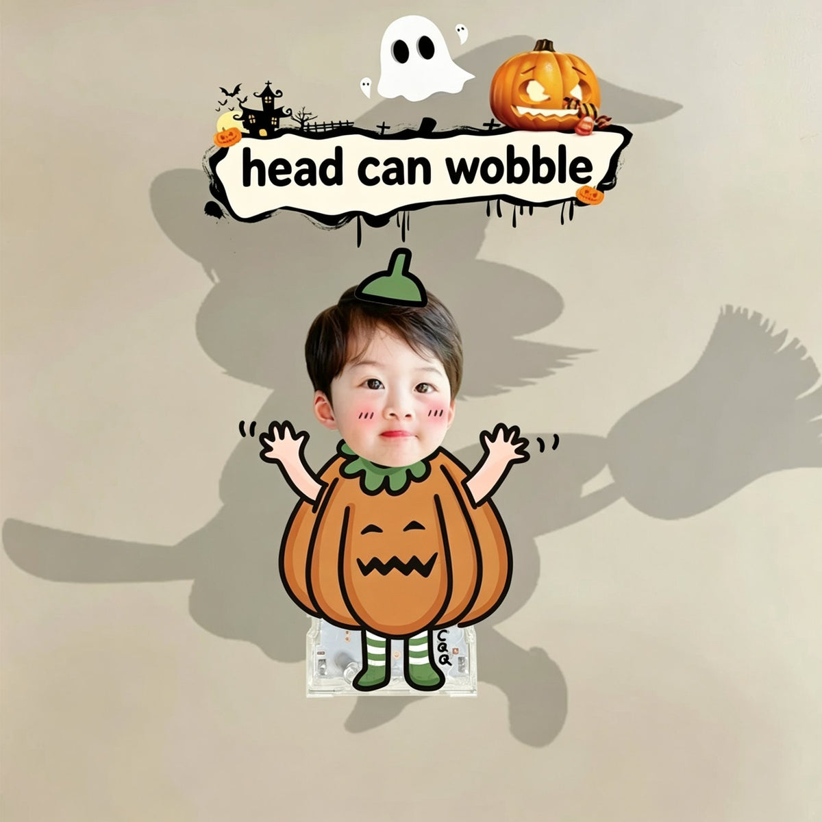 Custom Halloween pumpkin photo wobble figure — little boy in a pumpkin costume with a ghost and jack-o'-lantern, personalized Halloween wobbling desk ornament