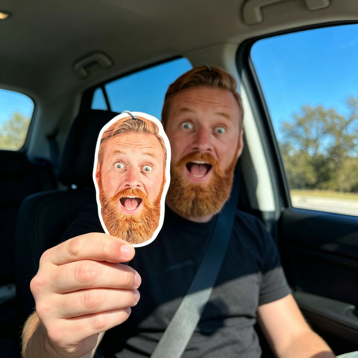 Man holding a custom photo air freshener with his face cut out — premium cotton paper, double-sided print