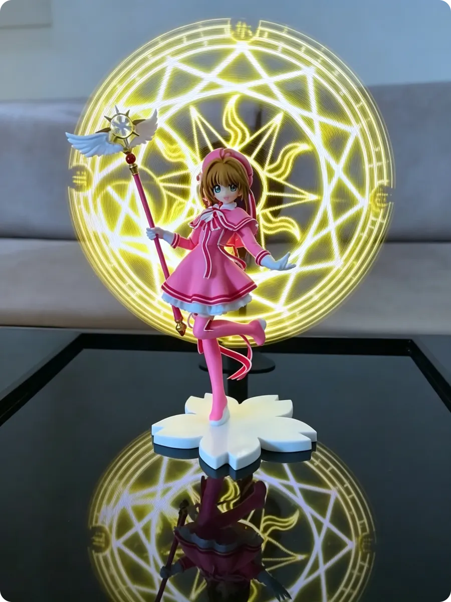 anime hologram fan projecting golden magic circle behind magical girl figure with star wand
