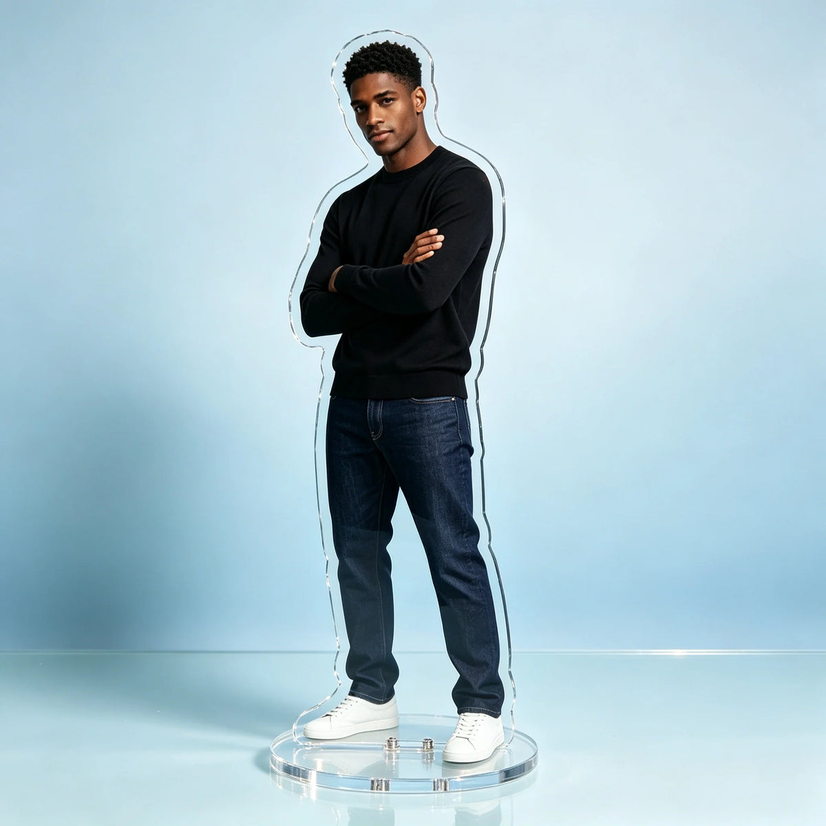 Custom photo acrylic standee of a man in a black sweater, contour-cut clear acrylic on a round base