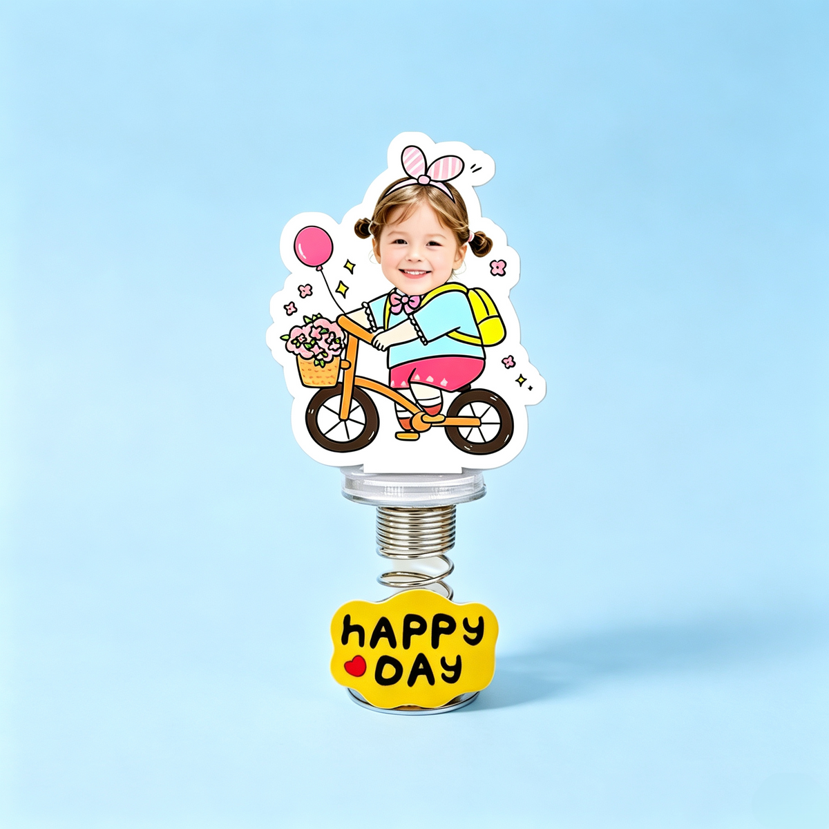 Birthday Bike Custom Photo Spring Bobblehead — personalized acrylic spring figure made from your photo, girl on a bicycle