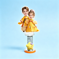 Golden Duo Custom Photo Spring Bobblehead — personalized acrylic spring figure made from your photo, two kids in golden