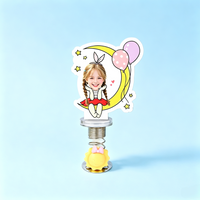 Moon Dreamer Custom Photo Spring Bobblehead — personalized acrylic spring figure made from your photo, girl sitting on the