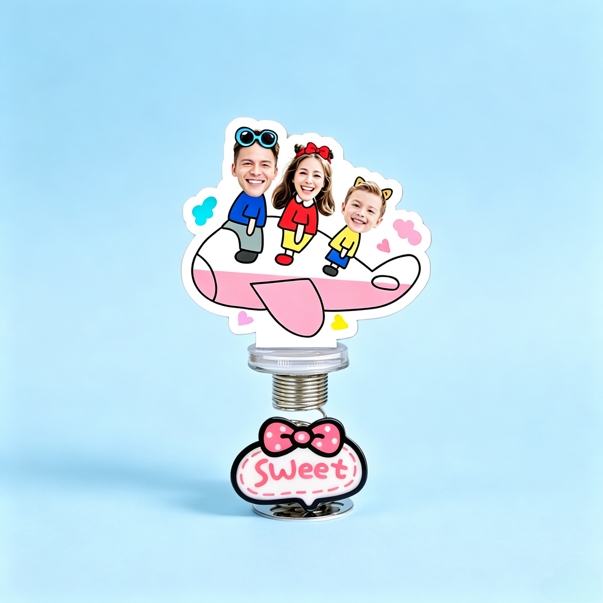 Pink Plane Family Custom Photo Spring Bobblehead — personalized acrylic spring figure made from your photo, family of four