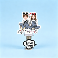 Sweetheart Couple Custom Photo Spring Bobblehead — personalized acrylic spring figure made from your photo, couple sitting together in matching overalls