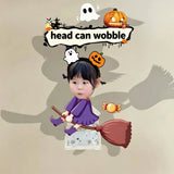 Custom broom rider witch photo wobble figure — little girl in a purple dress riding a broom with a pumpkin headband and candy, personalized Halloween desk ornament
