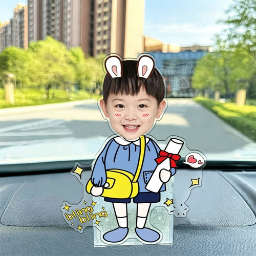 Custom bunny ear boy photo wobble figure — happy boy with bunny ear headband holding a diploma scroll and yellow bag, bling bling stars, personalized wobbling desk ornament