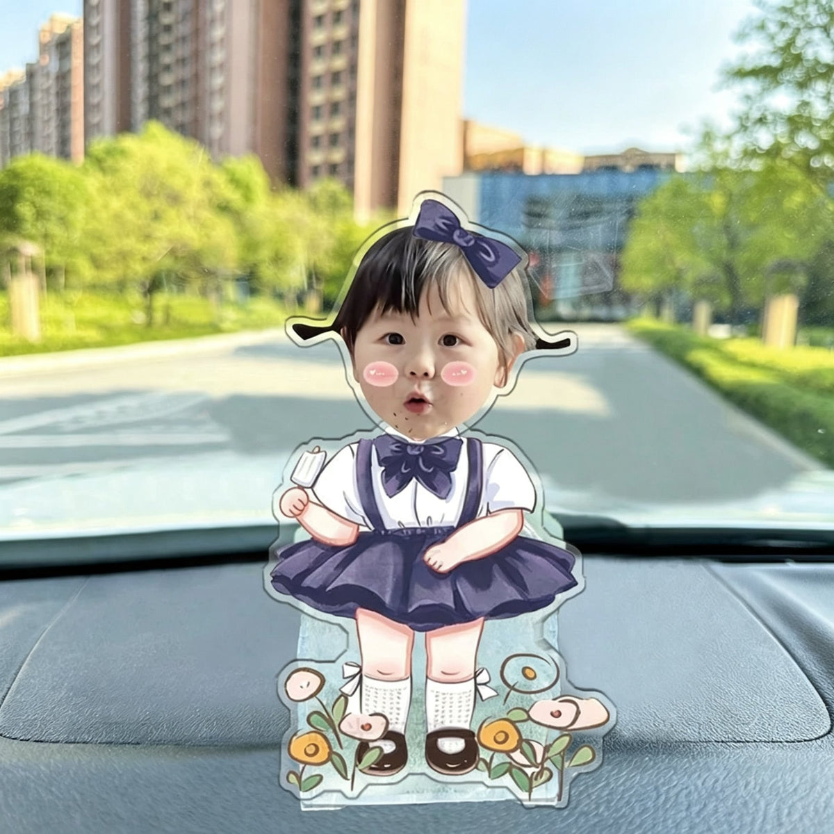 Custom navy bow girl photo wobble figure — little girl in a navy tutu dress with a big bow holding a popsicle among flowers, personalized wobbling desk ornament