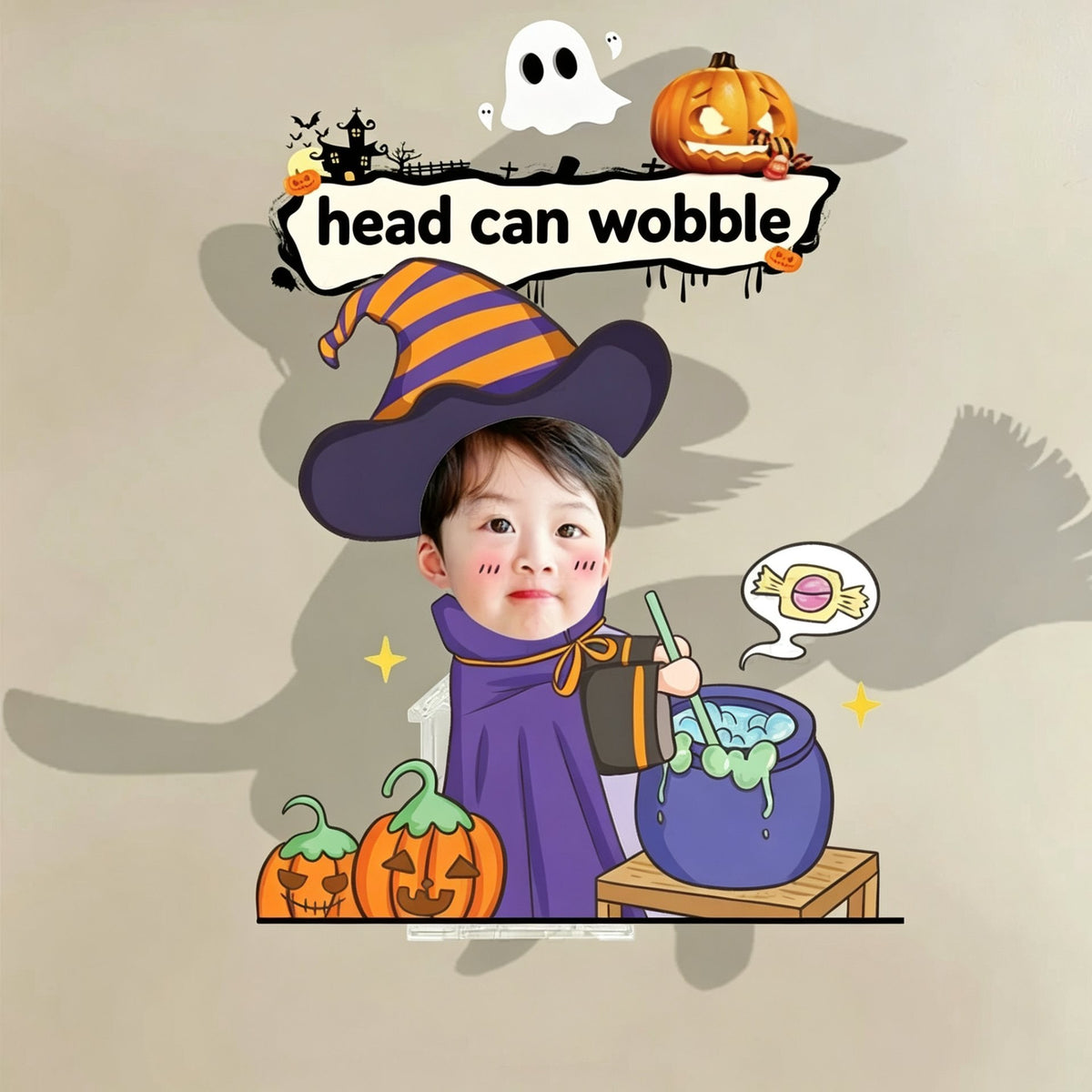 Custom pumpkin wizard photo wobble figure — little boy in a striped witch hat stirring a wizard cauldron beside carved jack-o'-lanterns, personalized Halloween desk ornament