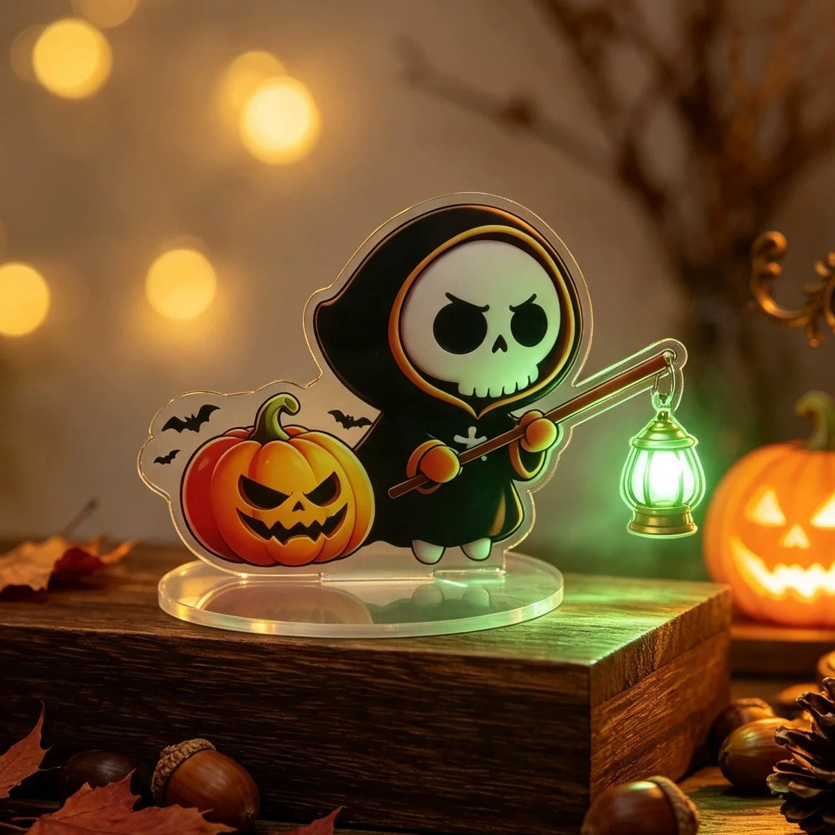 Halloween ghost acrylic standee sensor light — cute hooded ghost holding a lantern glowing with green LED light, motion-activated acrylic desk decoration
