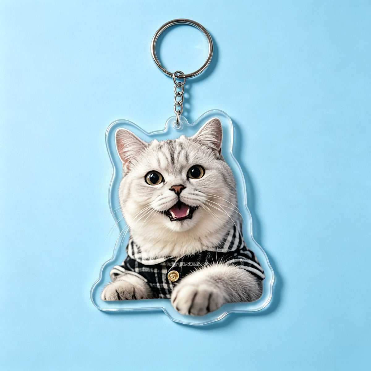 Personalized acrylic keychain mockup featuring a beloved pet photo printed on clear acrylic